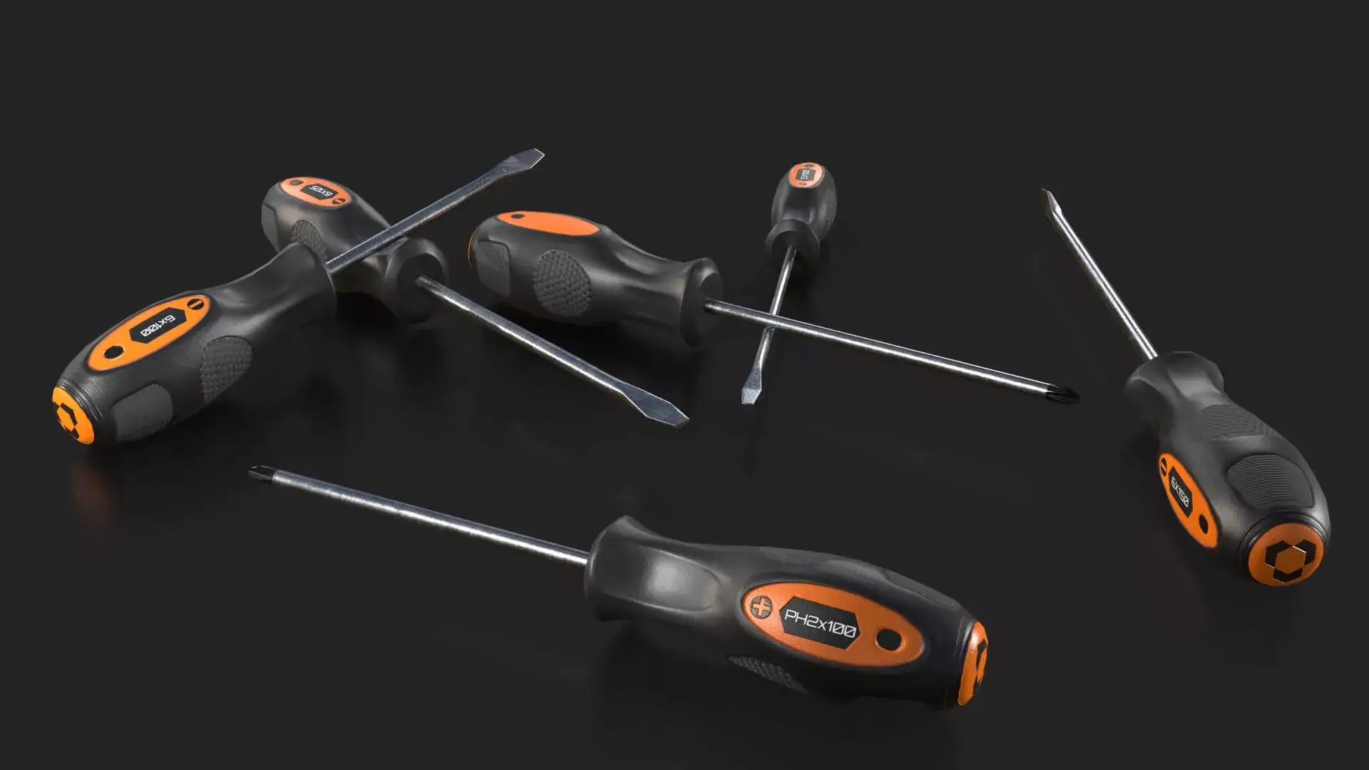 Set of black and orange screwdrivers on a black background