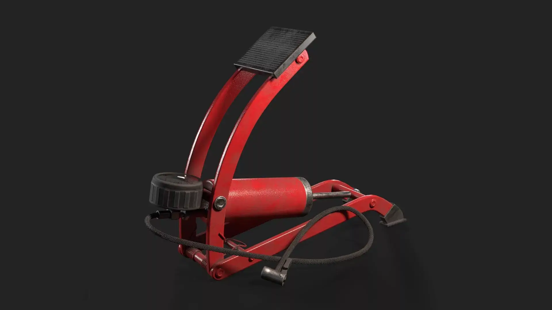 Red foot pump with hose on a black background